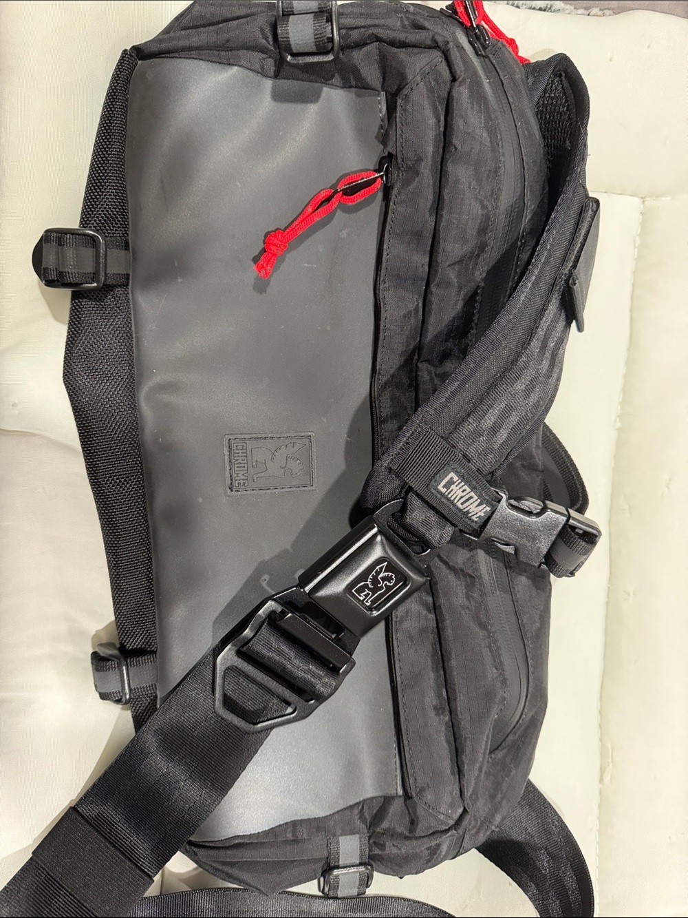 Chrome Urban Sling Pack in Black with Red Accents